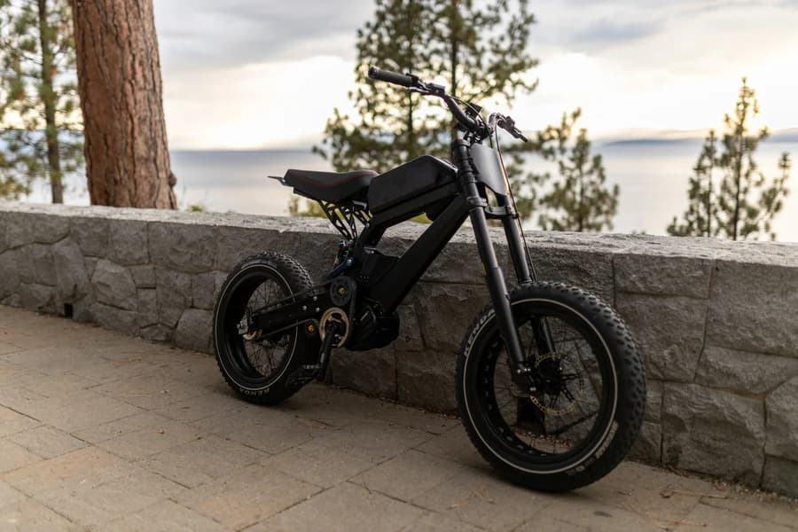 REVV e-bike overlooking Lake Tahoe at golden hour
