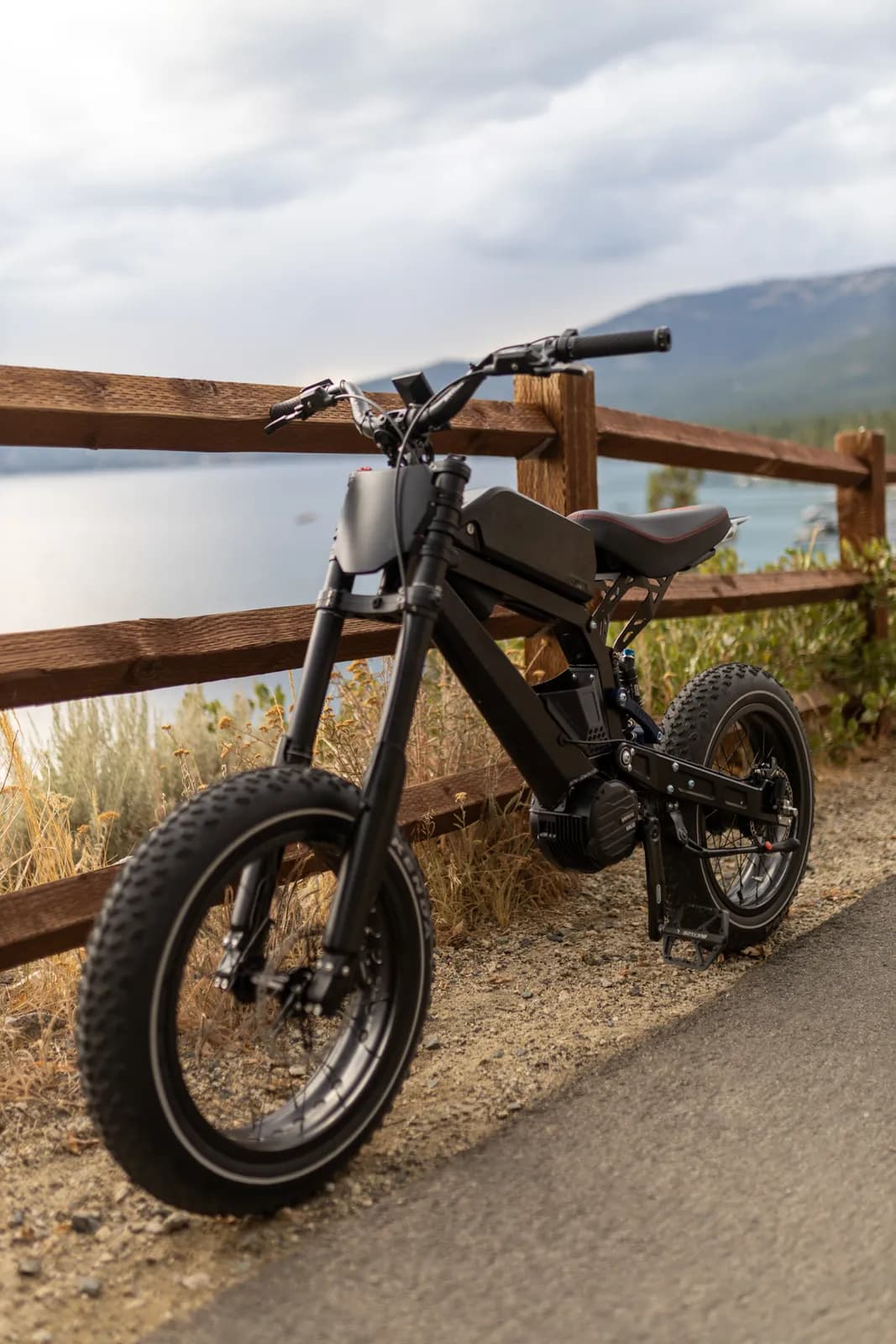 Revv Co Surfline fat-tire e-bike parked by a mountain lake